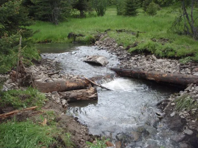Channel construction through reclaimed ground