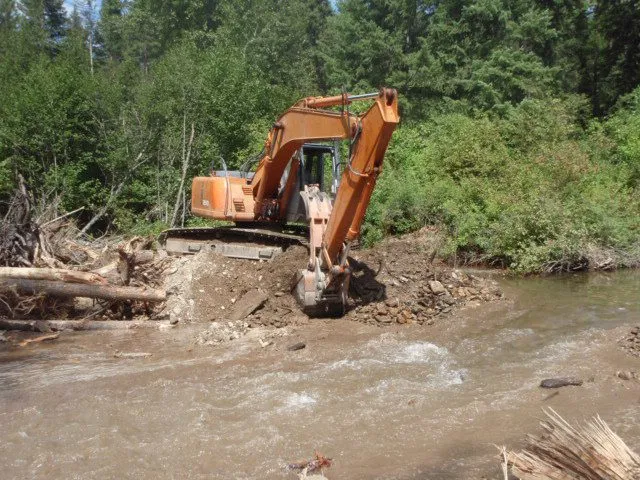Bank treatment construction along a restored stream Bank treatment construction along a restored stream